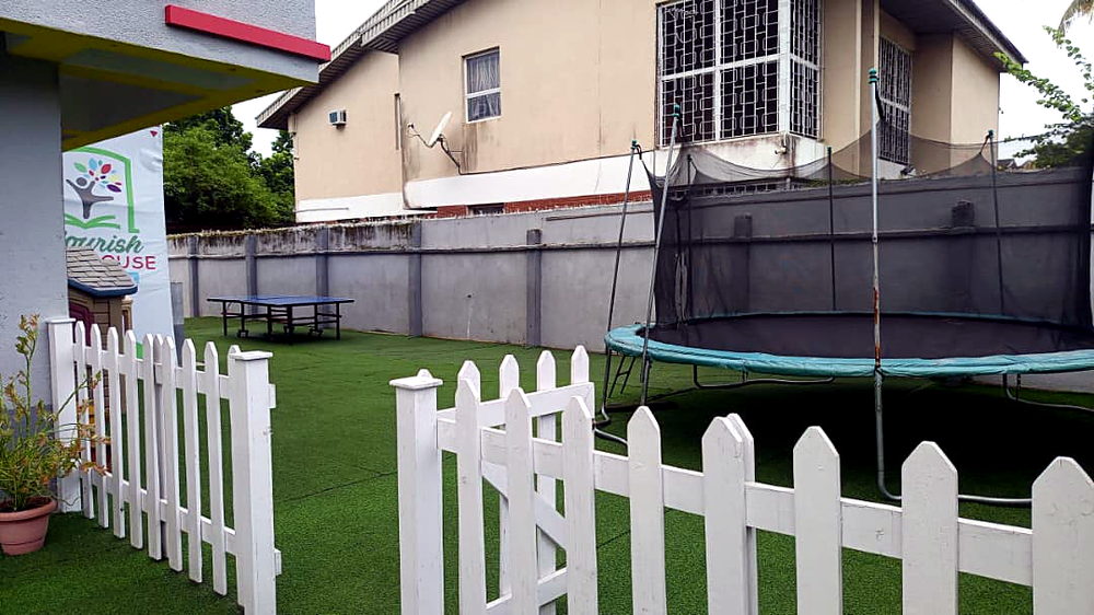 Table tennis table on the artificial grass playground